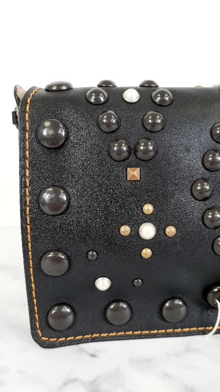 Ladies Coach Tabby bags with a textured leather surface for a more tactile lookCoach 1941 Dinky 24 in Black Leather with Western Rivets - Crossbody Flap Bag Shoulder Chain Coach 56611