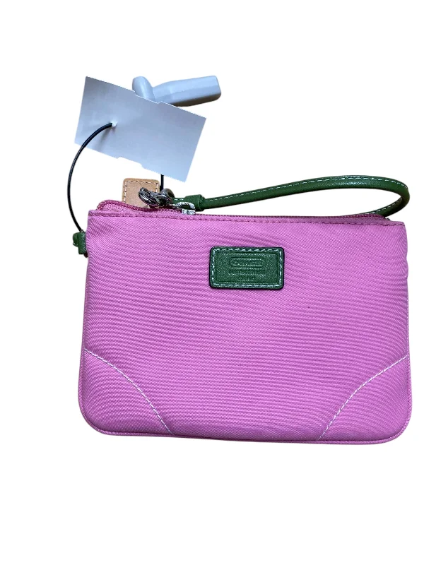 Ladies Coach handbags with a detachable wallet insert for added convenienceWristlet Designer By Coach, Size: Small