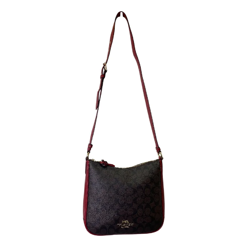 Coach Dempsey bags with a contrast - colored interior for visual interestCrossbody Designer By Coach In Red, Size:Medium