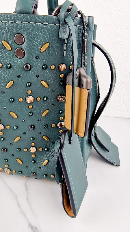 Ladies Coach crossbody bags with a single - strap design for simplicityCoach 1941 Rogue 25 in Dark Turquoise With Prairie Rivets Pebble Leather Satchel - Coach 21590