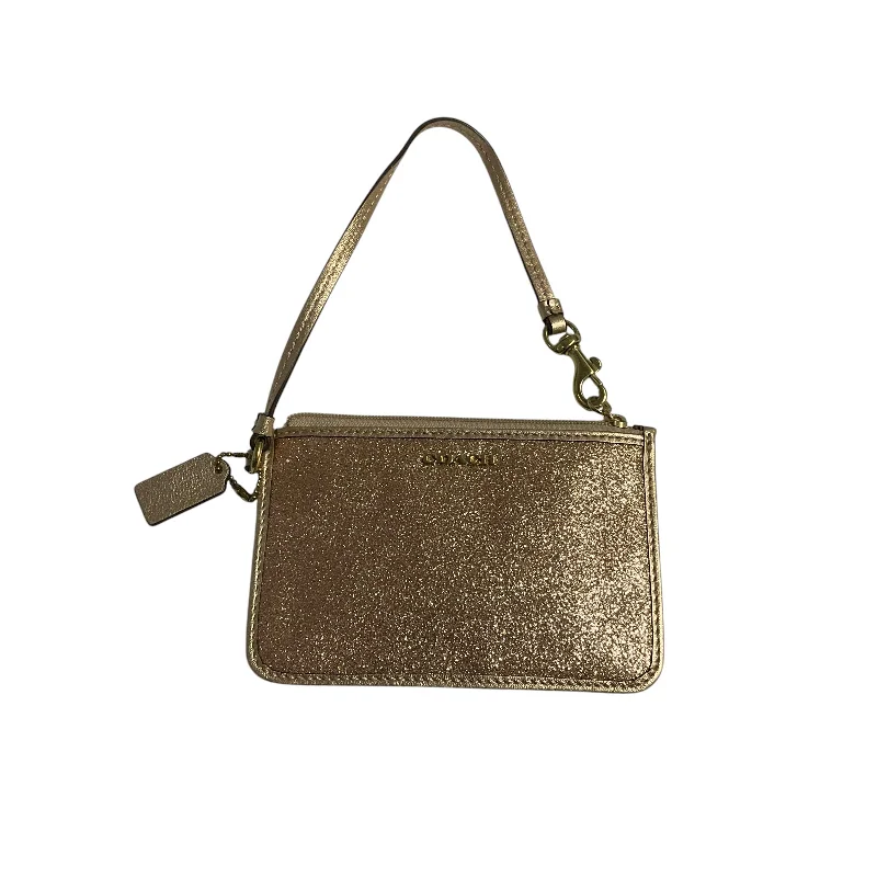 Ladies Coach Rogue bags with a star - shaped charm for a playful touchWristlet Designer By Coach, Size: Small