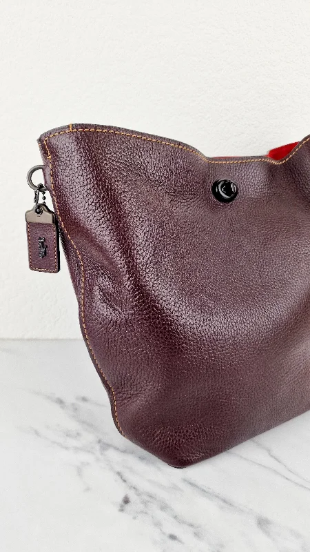 Coach bags with a detachable mobile phone holder for on - the - go useCoach 1941 Duffle Bag in Oxblood Brown Pebble Leather - Crossbody bag - Coach 58019