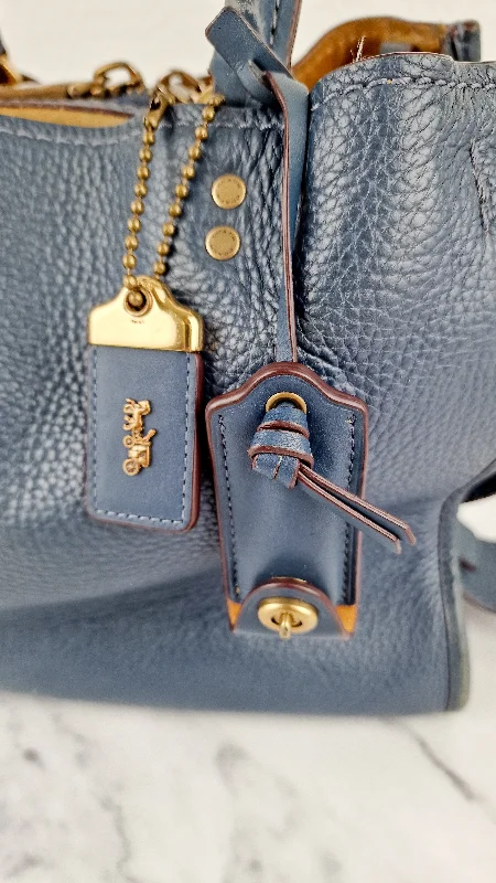 Coach bags with a front - zip pocket for small items like keys and cardsCoach 1941 Rogue 31 in Dark Denim Blue Shoulder Bag Satchel Handbag Coach 38124