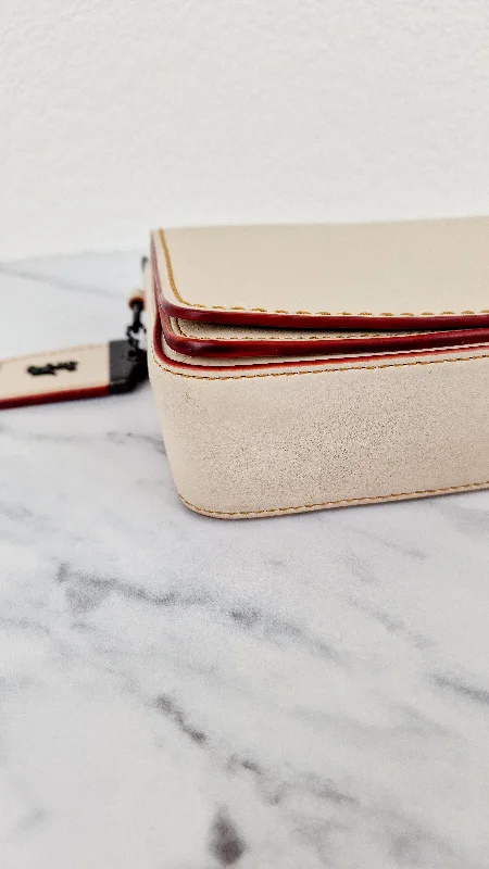 Coach Tabby bags with a classic turnlock closure for a timeless styleCoach 1941 Dinky in Chalk White Smooth Leather - Crossbody Chain Bag - Coach 55149