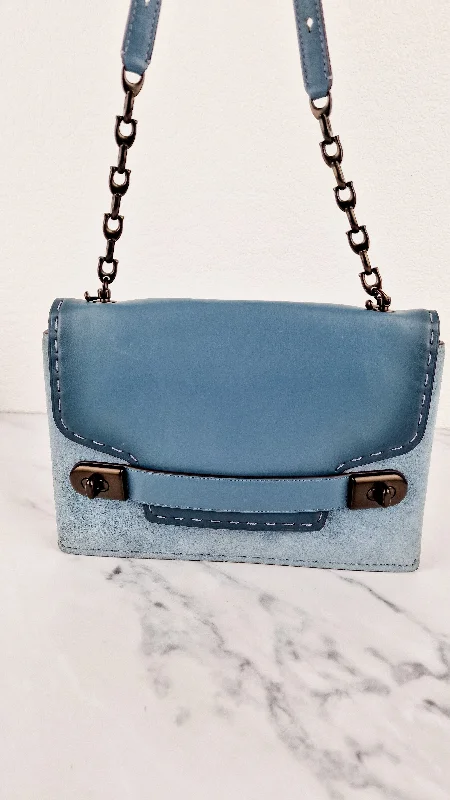 Coach Dempsey bags with a crystal - embellished C - logo for added luxuryCoach 1941 Swagger Crossbody Chambray Blue Suede & Smooth Leather - Clutch Shoulder Bag Coach 25833