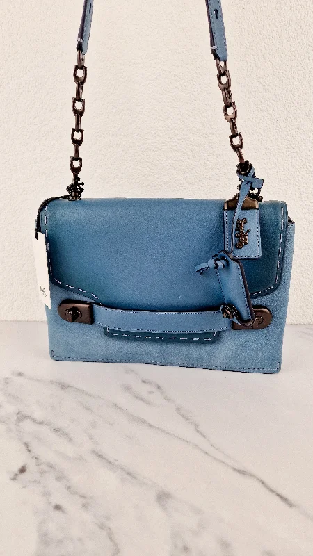 Coach Rogue bags with a monogram - embossed leather surfaceCoach 1941 Swagger Crossbody in Chambray Blue Suede & Smooth Leather - Clutch Shoulder Bag- Coach 25833